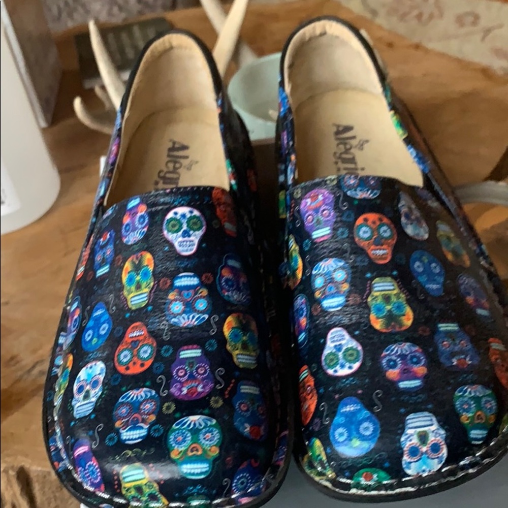 Sugar Skull Nursing shoe, almost new. These are so cute and comfy.
